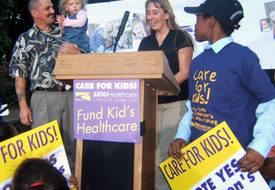 At 300 vigils, the cry is, Dont let Bush take away kids health care!