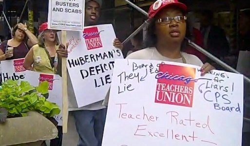 Teachers, parents protest school layoffs