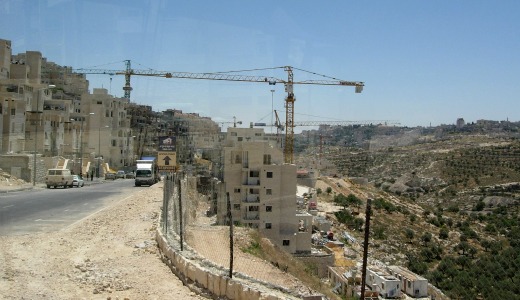 Dutch probe company over Israeli wall, settlement construction