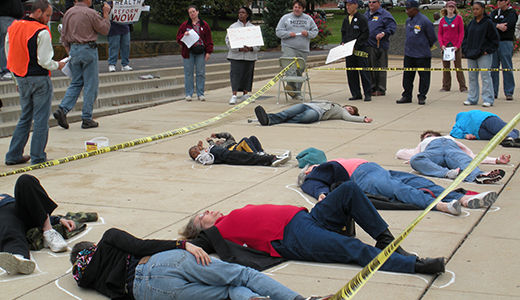 St. Louis activists stage die-in at Wellpoint