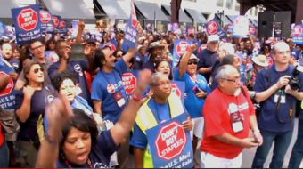 Postal workers and supporters rally to save the mail