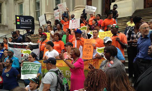 New Yorkers protest hedge fund-backed charter school ad