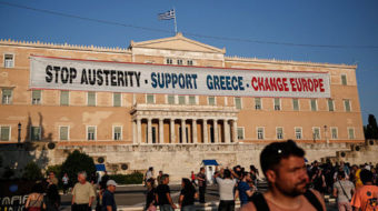 Greece on the brink as default passes