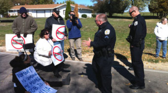 Opponents of outsourcing arrested at Bain plant for blocking trucks