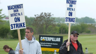 Caterpillar workers strike against take back contract