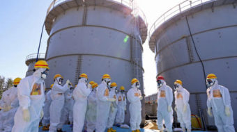 Workers hit with radioactive water as Fukushima disaster continues