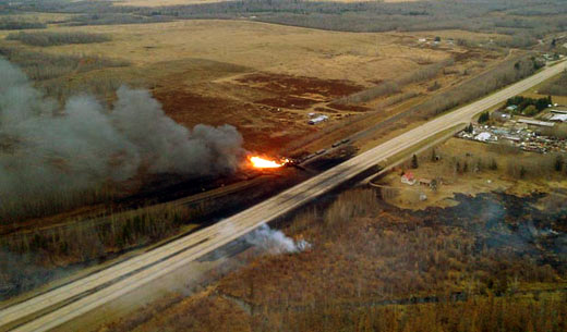 Train carrying oil derails, sets Alberta town ablaze
