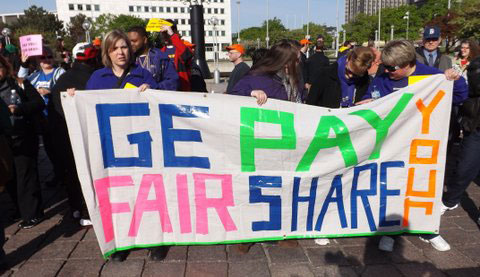 Protesters demand GE pay its taxes