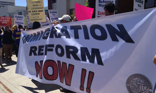 Video: Protest targets senator as immigration bill progresses