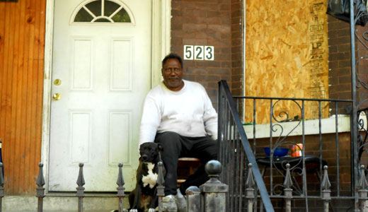 Foreclosed homeowner stands his ground on his own porch