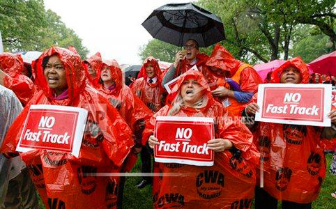 Unionists storm Capitol Hill to lobby lawmakers vs. fast-track