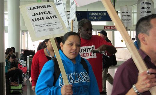 Oakland Airport concession workers win some, and keep up the fight
