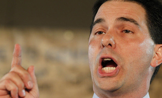 Wisconsin governor swings budget axe