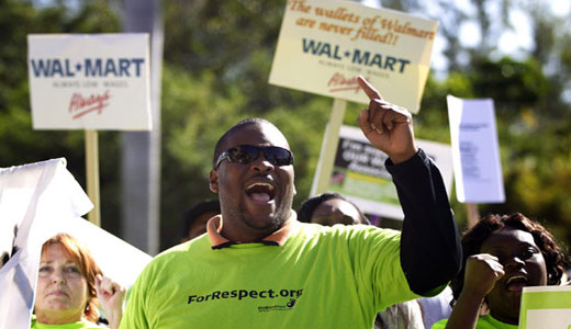 Workers strike as D.C. city council defies Walmart on wages