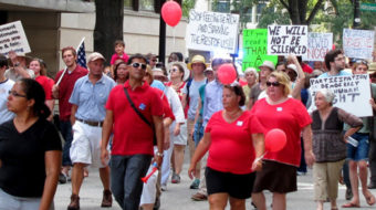 Thousands rally at N.C. Moral Monday vowing “silence never again.”