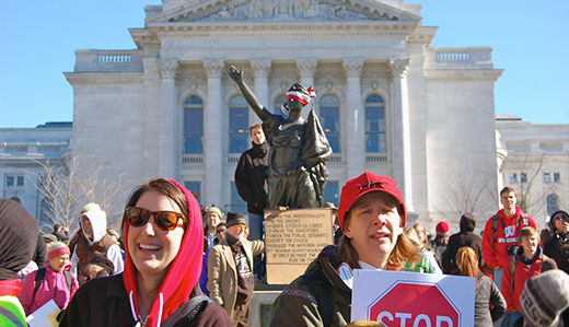 Record protests rock Wisconsin, workers stand firm in Indiana