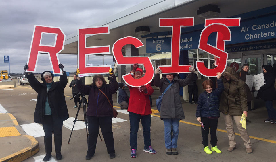 Crowds at St. Louis Lambert International Airport hit refugee ban