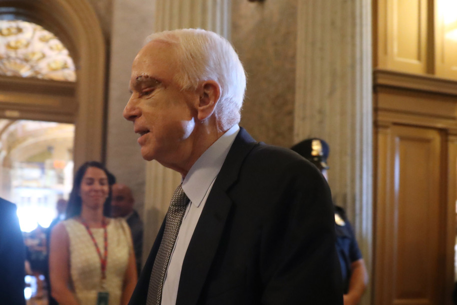 McCain flies in and Pence breaks tie to debate health bill