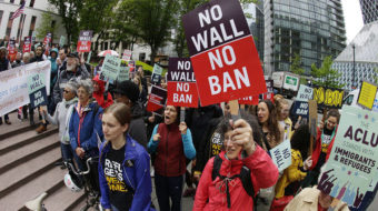 Federal judge hands a partial defeat to Trump’s travel ban