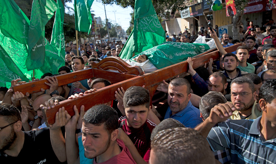Palestinians bury those gunned down by Israel