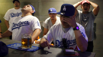L.A. Dodgers cross picket line in Boston a day before World Series Game 1