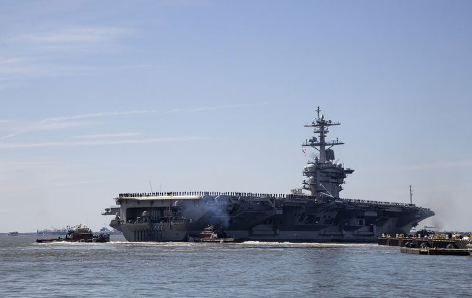 Trump sends aircraft carrier and strike force to threaten Iran