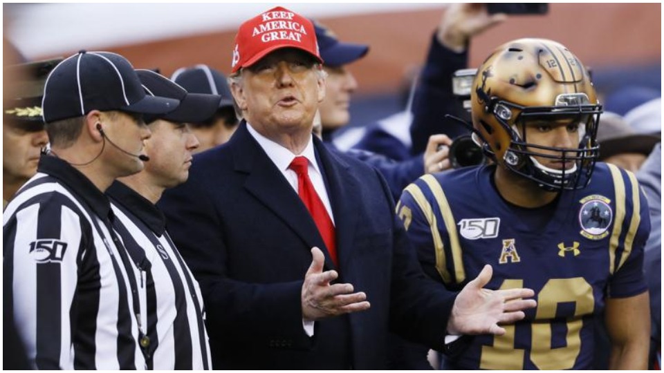 Can Trump pass up chance to cheer for war at college football championship?