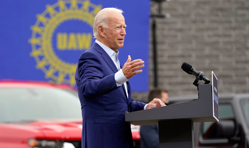 Biden tells UAW he plans clean energy factory future