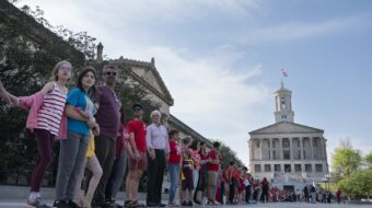 Thousands in Nashville form miles-long human chain linking arms for gun control