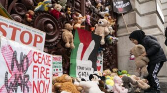 British kids and parents bury government office with toys representing dead Palestinian children