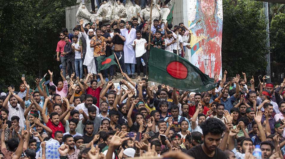 Bangladeshi PM resigns and flees as crowds storm palace