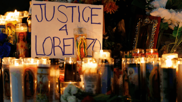 In somber ceremony, community lights memorial candles for ICE victims