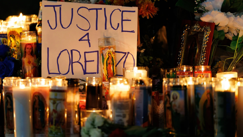 In somber ceremony, community lights memorial candles for ICE victims